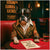 Boston Terrier artwork titled Lounge Lurking Licker on ChromaLuxe Metal, featuring an elegant vintage lounge scene.