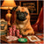 Brussels Griffon dog playing poker surrounded by poker chips and playing cards