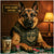 German Shepherd wearing tactical vest playing poker artwork