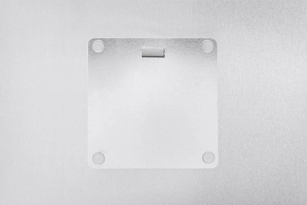 Horizontal back of metal print artwork showing a central sawtooth hanger and four round rubber bumper tabs at each corner; no framing needed, arrives ready to hang.