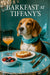 Dapper beagle wearing a blue scarf at Tiffany-blue table with ricotta toast, bowl of berries, cocktail glass and chandelier in background