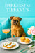 Expressive Brussels Griffon seated on a turquoise banquette at a riveted metal table with ricotta-topped canapés, mini muffins, a peach-hued cocktail and ranunculus bouquet under neon “Barkfast at Tiffany’s” sign