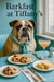 English Bulldog wearing a Tiffany-blue scarf seated on a tufted turquoise banquette beside a table set with berry muffins, cheese tea-sandwiches and a peach-hued cocktail under “Barkfast at Tiffany’s” lettering