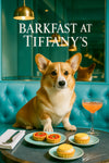 Happy corgi sitting on turquoise tufted booth next to plates of tomato tarts lemon cream tarts and a peach cocktail under a brass pendant lamp with Barkfast at Tiffanys sign