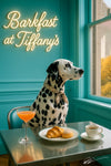 Dalmatian wearing floral scarf seated at Tiffany blue booth beside metal table with croissant pastry frothy peach cocktail and cup of coffee by window