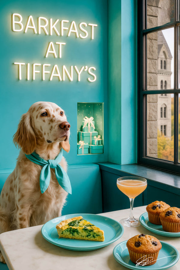 English setter wearing turquoise scarf sitting on turquoise banquette beside marble table with spinach quiche blueberry muffins and peach cocktail under neon Barkfast at Tiffany’s sign