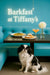 Japanese Chin sitting under a table with spinach frittata, whipped cheese topped brioche rounds, a pink cocktail, and a small white dahlia on a dark wood table