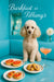 Cream poodle seated on a teal banquette beside plates of tomato tartlets, mini tomato bites, chocolate-chip cookies and a pink cocktail