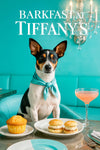 Rat Terrier wearing a turquoise scarf seated at a turquoise banquette by a metal café table with a muffin, two mini egg salad sliders, and a peach cocktail under a crystal chandelier