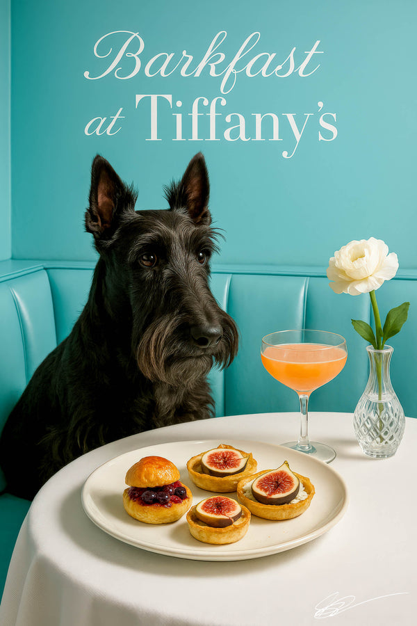 Scottish Terrier seated in a turquoise booth beside a table with fig tarts a berry bun a peach cocktail and a white flower in a glass vase under a neon Barkfast at Tiffanyâs sign