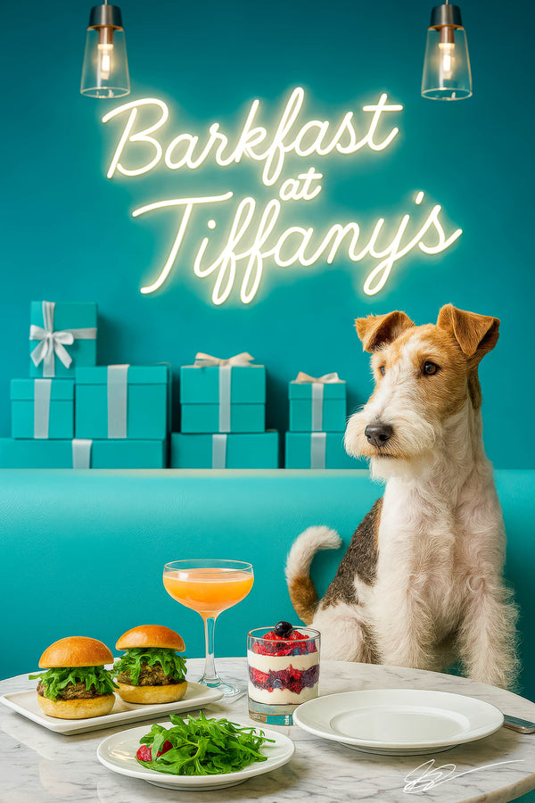 Wire fox terrier standing in a teal booth with two arugula topped sliders a side salad berry parfait and a peach cocktail on a marble table