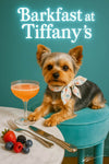 Yorkshire terrier wearing a floral scarf seated on a turquoise stool beside a marble table with silver knife and fork mixed berries and an apricot cocktail