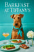 Airedale Terrier wearing a Tiffany blue scarf seated at a brunch table with fig toast, arugula tartlets, mimosa, and a white bloom