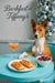 Basenji dog at a Tiffany-blue café table with smoked-salmon toast garnished with chives, a bowl of raspberries and blueberries, and a peach cocktail beside a silver bubble sculpture