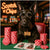 scottish terrier at poker table with red chip stacks and neon scotch n chips sign