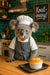 Koala wearing a chef hat and apron proudly presenting a soufflé in a cozy kitchen in artwork titled Koal-inary
