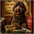 Labradoodle wearing a gold chain seated at a table with Lounge Bones, Wrapped Woof treats, Canine Cabana tin, and sticks labeled Sniff & Sip under a Doodles & Lounge Divas sign.