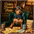Miniature Pinscher in a bow tie seated at a poker table with customized playing cards, poker chips, and a bag of Pixie Bites.