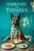 Belgian Malinois in a teal scarf seated at a Tiffany-blue table with spinach quiche, herbed toast, whipped-cream-topped brioche and cocktail under Barkfast at Tiffany’s sign and gift-box display