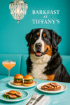 Bernese Mountain Dog seated at a Tiffany-blue tufted banquette table with two mini sliders, a slice of fig-and-walnut toast, a plate of fig slices on microgreens, and a frothy peach cocktail under a chandelier