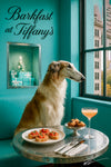 Graceful borzoi in a turquoise scarf seated by a city-view window on a turquoise banquette, with tomato tartlets, caviar brioche bites & peach cocktail under “Barkfast at Tiffany’s” sign