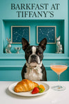 Tuxedo-masked Boston Terrier in a floral scarf at white table with croissant, strawberry, kiwi slice & blush cocktail under neon “Barkfast at Tiffany’s” sign