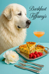 Great Pyrenees reclining by turquoise table with spinach quiche, raspberries on silver tray, brunch cocktail, and peony