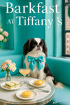 Japanese Chin wearing teal bow tie seated on a teal banquette beside cucumber tea sandwiches lemon tart spinach quiche and a pink cocktail