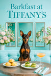 Black-and-tan Miniature Pinscher seated at turquoise banquette behind a metal table with powdered scones cucumber stack and a peach cocktail under Barkfast at Tiffanys sign