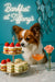 Tricolor Papillon sniffing a two tiered server of strawberry shortcakes and cucumber tea sandwiches next to a coupe of rosé and a pink rose against a teal mirror wall