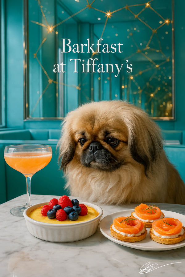 Regal Pekingese seated on a teal banquette beside a marble table with custard topped by raspberries and blueberries three smoked salmon tartlets and a pink cocktail under starlight mirror