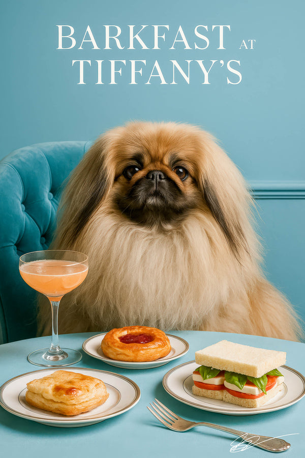 Regal Pekingese seated on a teal tufted banquette beside a matching teal table with a square puff pastry, jam filled pastry ring, caprese tea sandwich and a pink cocktail
