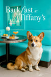 Pembroke Welsh Corgi seated beside a riveted metal café table with two cheese scones a golden swirl pastry a pink cocktail and white flowers in a teal lounge