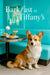 Pembroke Welsh Corgi seated beside a riveted metal café table with two cheese scones a golden swirl pastry a pink cocktail and white flowers in a teal lounge