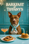 Pit Bull wearing a teal scarf seated at a teal banquette beside a café table with fig-topped cheese toast, two mini sliders and a pink cocktail