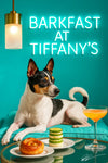 Rat Terrier reclining on a turquoise cushion at a reflective café table with a swirl pastry cucumber tower and peach cocktail