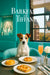 Russell Terrier seated on a Tiffany-blue armchair beside a large café window overlooking city buildings