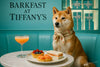 Shiba Inu wearing a floral scarf seated on a turquoise banquette beside a marble table with tea sandwich mixed berry tart mandarin tart and a pink brunch cocktail under a display of Tiffany style gift boxes