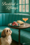 Shih Tzu gazing up at a round café table with pink macarons blackberries tea sandwiches and a peach brunch cocktail against a turquoise banquette