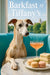 Whippet at a round marble table set with pastel macarons cucumber tea sandwiches and a peach cocktail against a window overlooking a green park