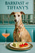 Whippet wearing a floral scarf seated at a teal booth with cucumber tea sandwiches two strawberry tarts and a peach cocktail on a round metal table