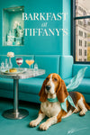 Basset Hound wearing a Tiffany-blue scarf lying by a marble table with a spinach quiche, Greek yogurt berry parfait, peach cocktail, salt & pepper shakers, and a white dahlia