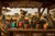 Four hyenas laughing at a safari bar with colorful cocktails and tiki mugs under a “Last Laugh Lounge – Happy Hour” sign