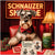 Elegant Schnauzer wearing a bow tie at a poker table with cards and casino chips