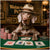weimaraner in fedora and “All Barks No Bluffs” collar leaning on poker table with red white and blue chips under a Weim-tensity Poker sign